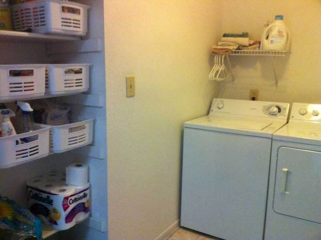 Large laundry room upstairs between the two bedrooms. New washer and dryer since this picture.