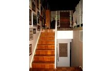 Stairs to living room, kitchen and deck