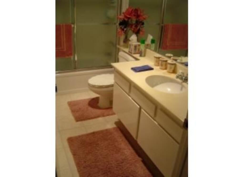 Upstairs Bathroom with shower and tub