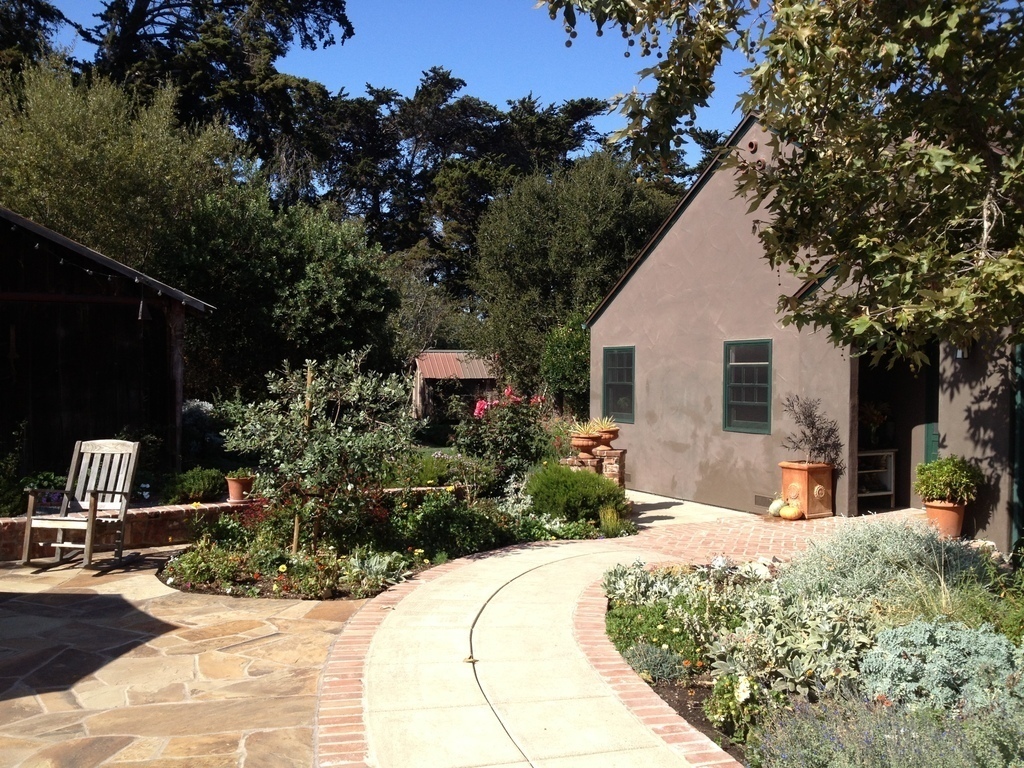 back-door entry with chicken coop in the background