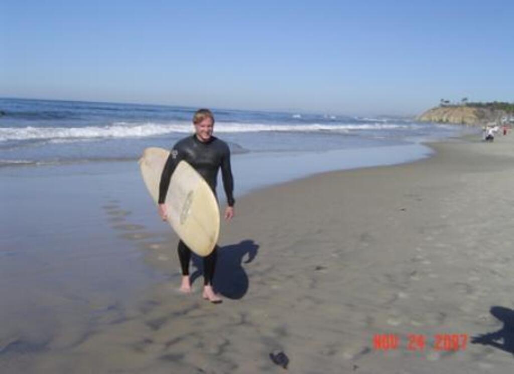 Our son after surfing at Moonlight Beach