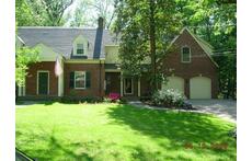 Our house, on a quiet suburban street.