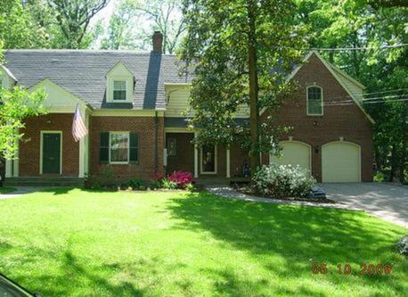 Our house, on a quiet suburban street.