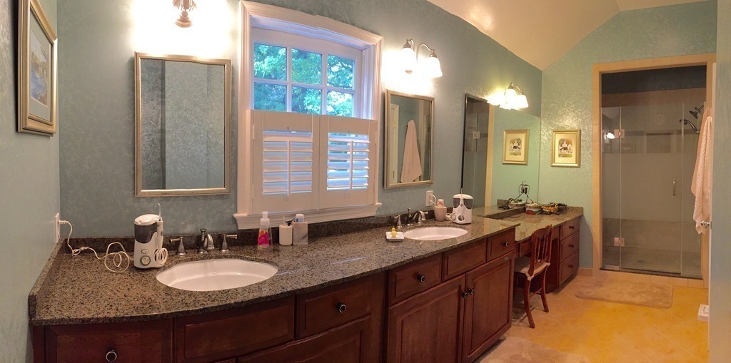 Ensuite Bathroom (Primary Bedroom) - cabinets and shower