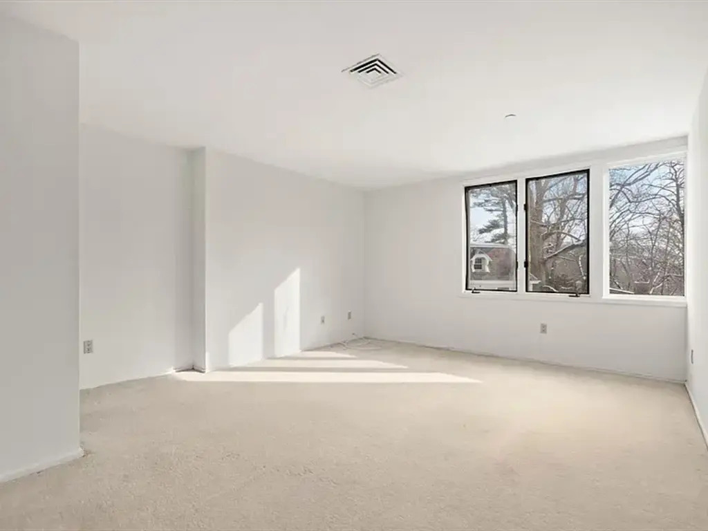 One of two bedrooms (each will be furnished with queen bed) 