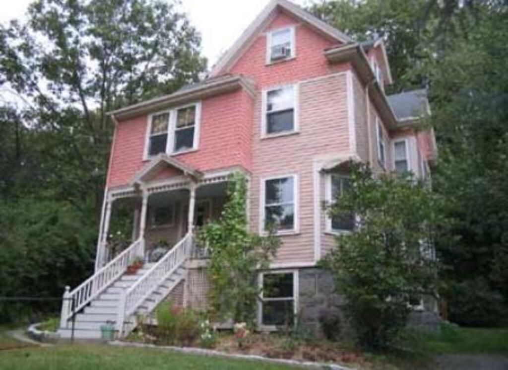 The house has been repainted some years ago.  I have included that photo too.