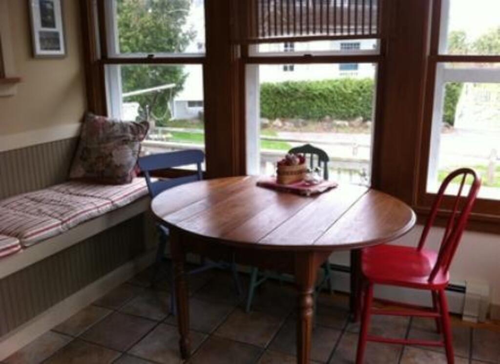 The porch looks out toward the lake