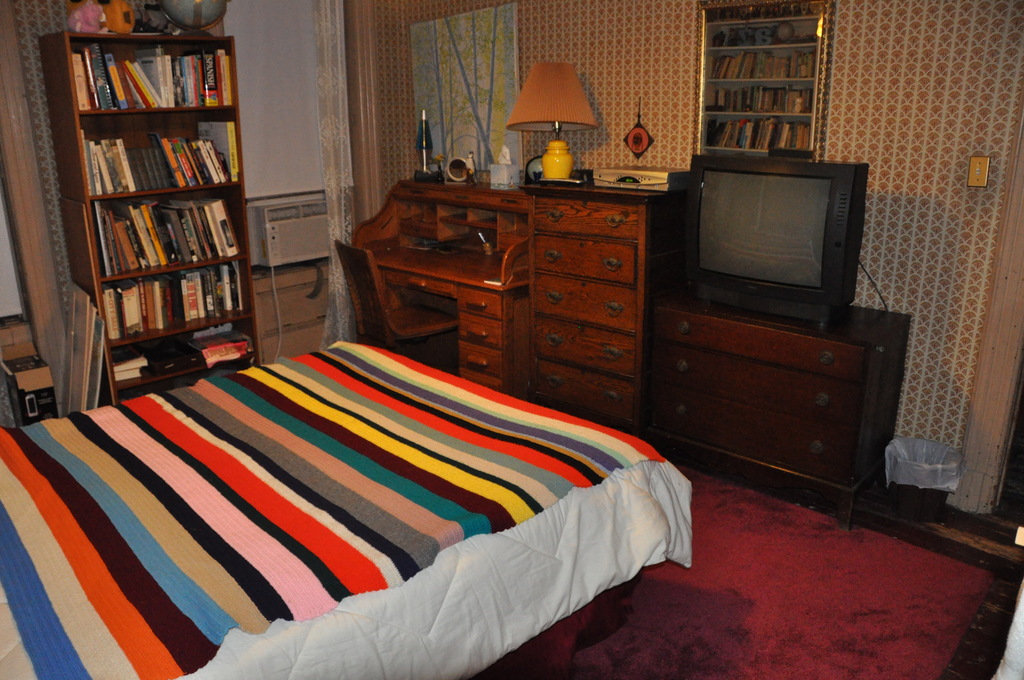 guestroom with queen-sized bed and television, third floor