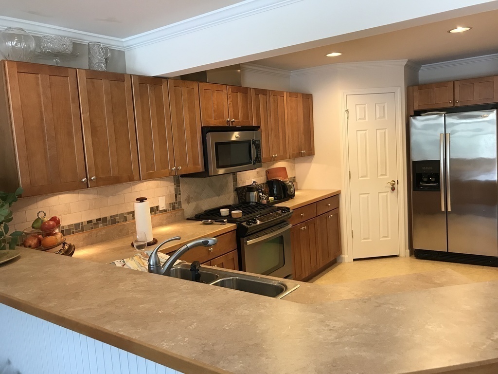 Corner Pantry and Mudroom adjoin kitchen from two car garage