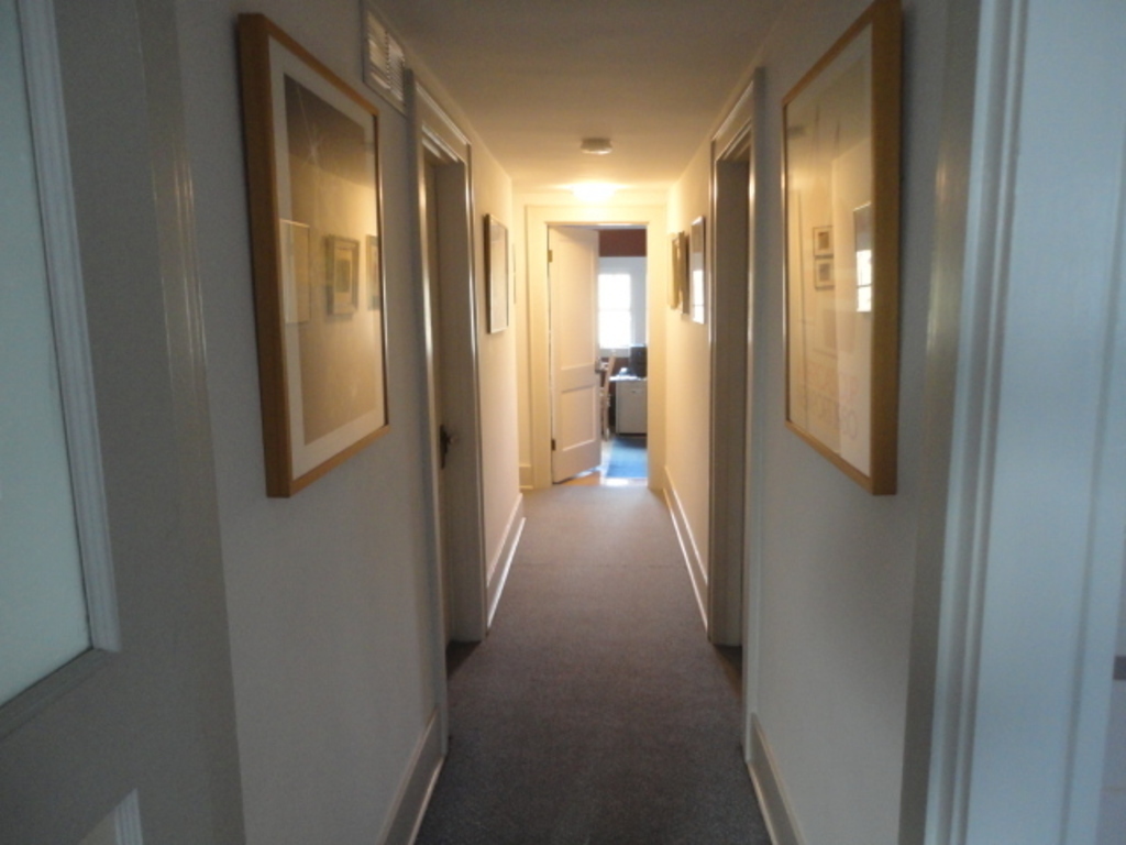 Hallway upstairs with my office in the distance