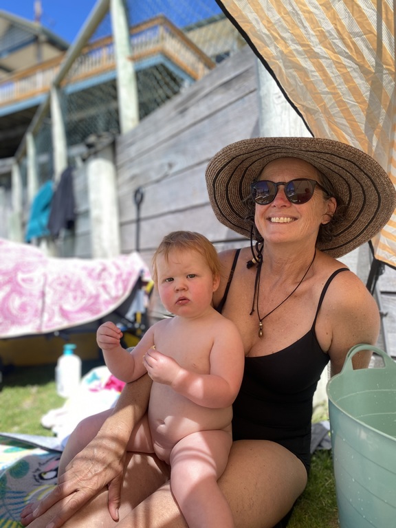 me having beach fun with grandchild