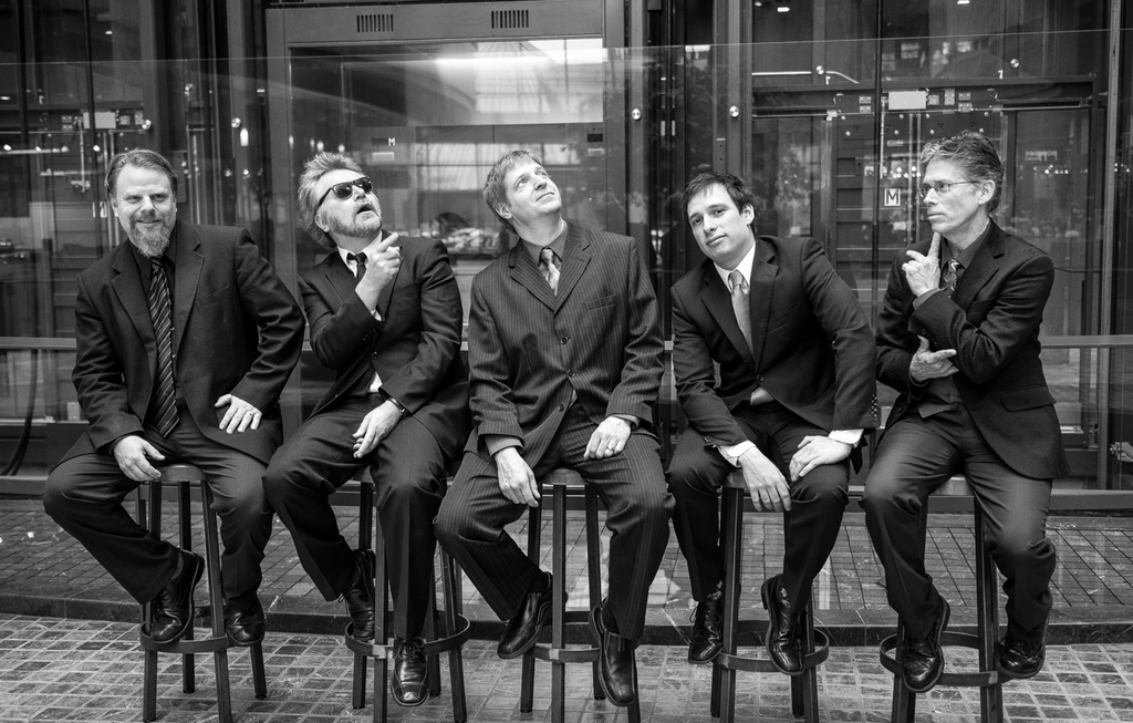 In my spare time I play in a funk-soul band called Groove Kitchen (I am the one in the sunglasses).