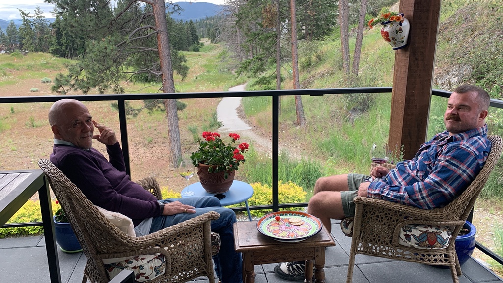 Geoff and son on our front balcony