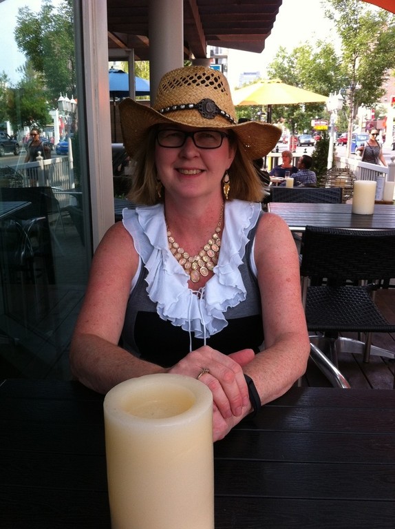 Theresa enjoying the Calgary Stampede. Early July.