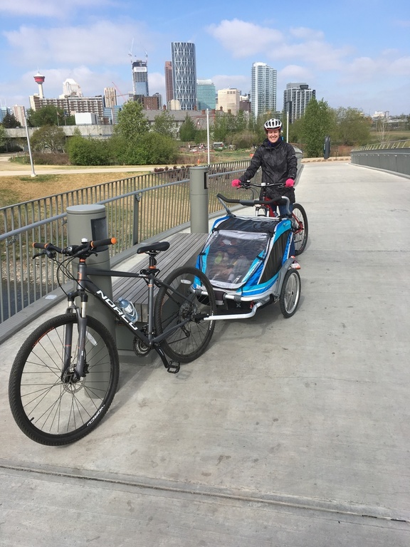 Biking on trail thru downtown on way to zoo in April, 2016.