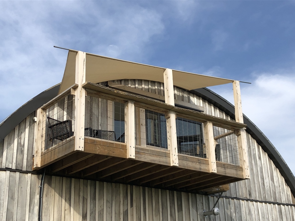 The apartment balcony, where you will stay. Drink your morning coffee while watching the trains in the distance.