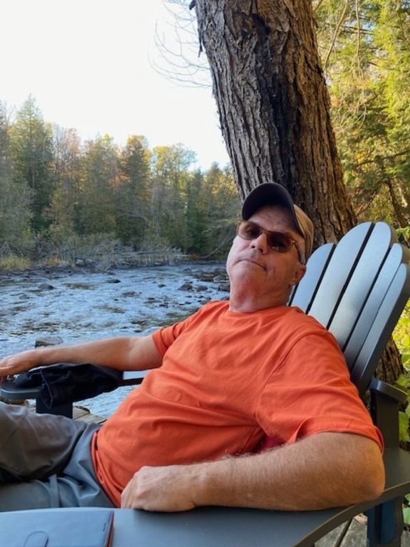 Enjoying time on the dock riverside at the cottage