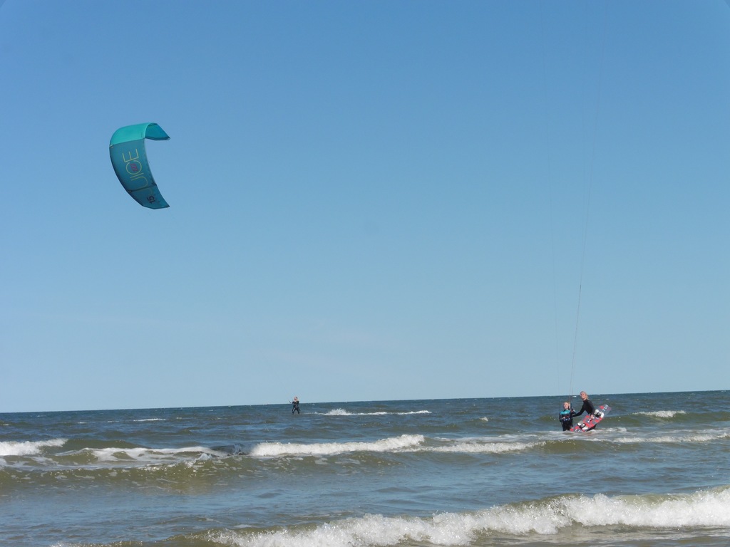 Family kite session at Baltic Sea
