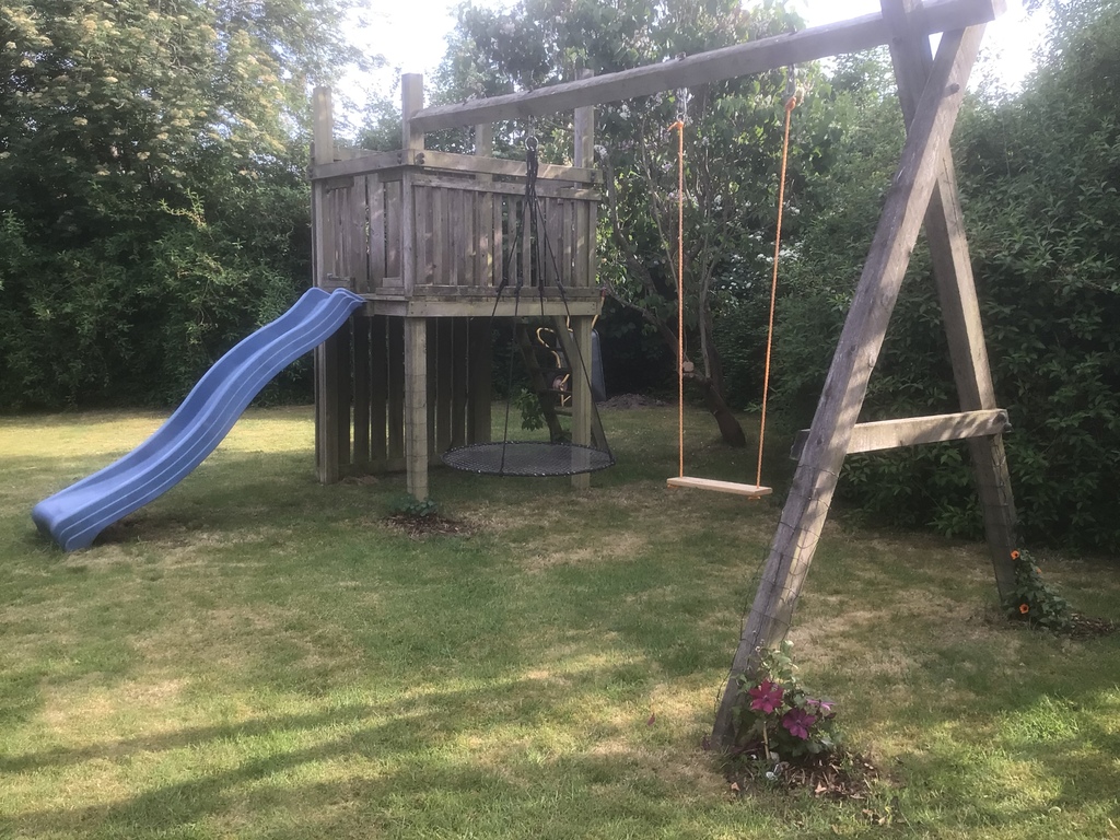 Swings and slides in the garden 