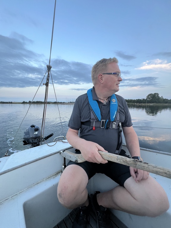 We are a sailing family and we have two boats, the smallest boat is closest to our House. 