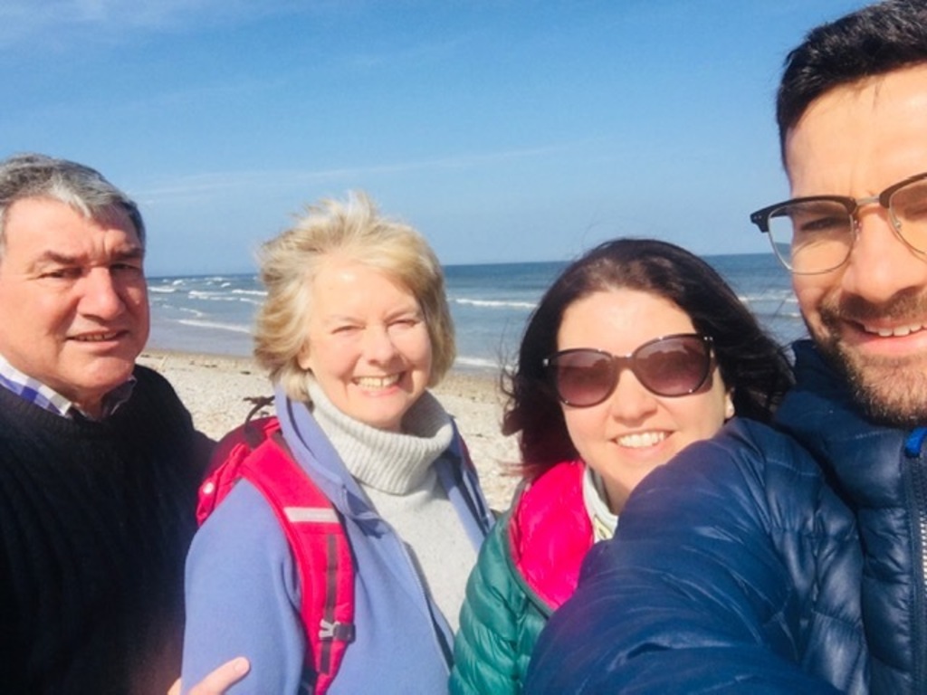 Tony, Anne, Lin, Stewart on a sunny beach in April 2022 in Morayshire, NE Scotland 