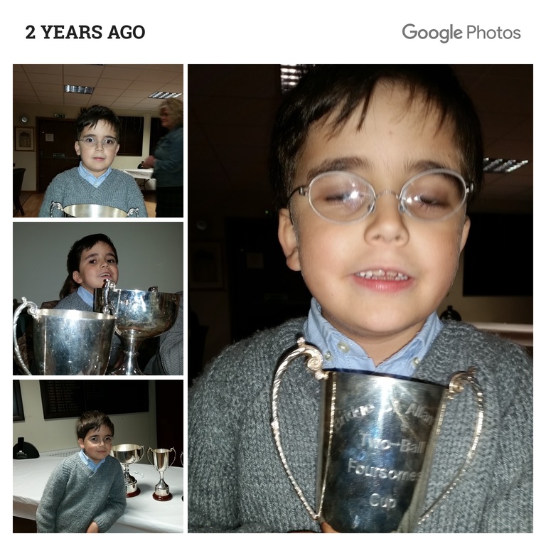 Oskar with my golf trophies