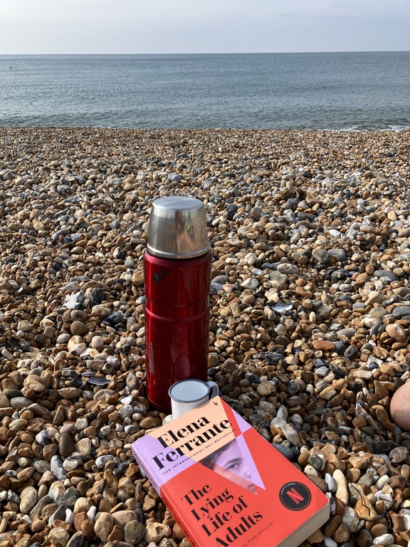 We find solace on the beach with a flask of coffee, a good book and a refreshing swim/dip