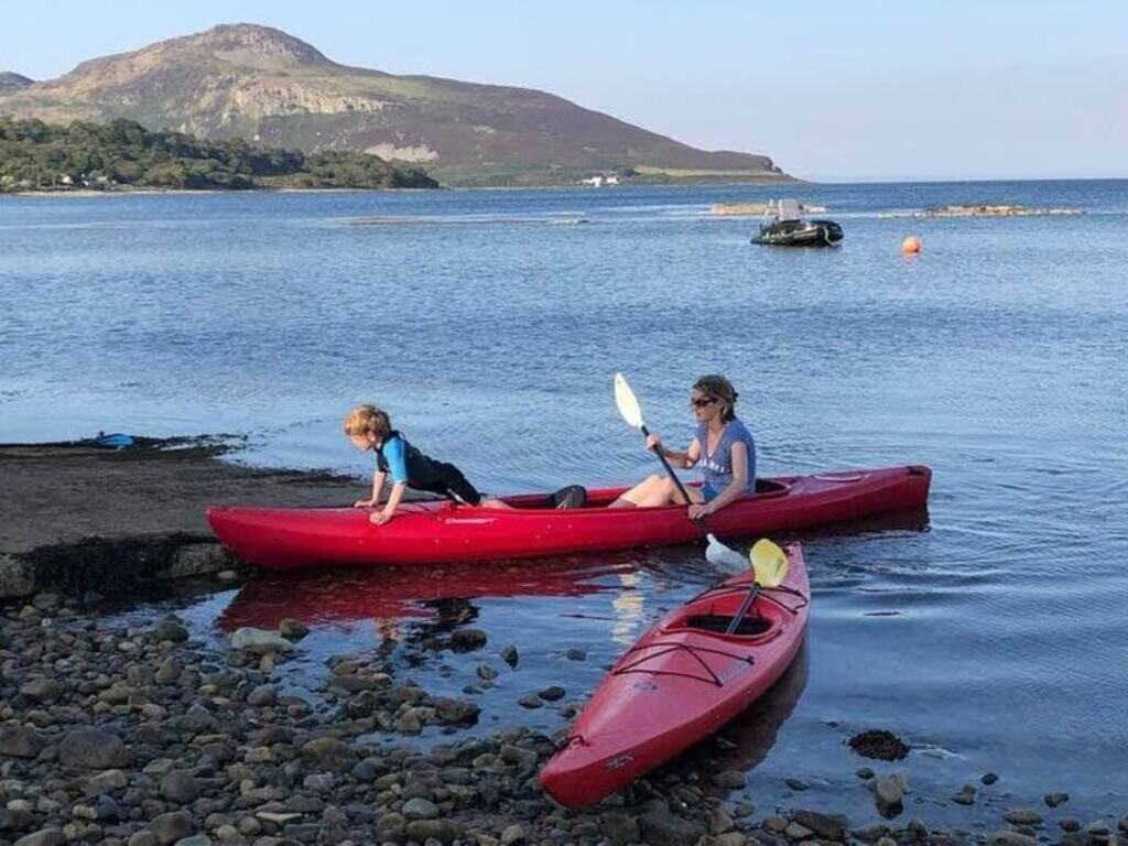 The water in the bay is very shallow - perfect for paddle boarding, swimming and kayaking