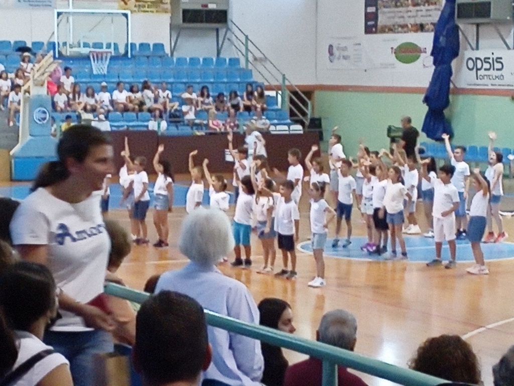 BACK OF ME WATCHINGMY GRANDAUGHTERS  FINISHING  SCHOOL   SHOW-PARADE!!