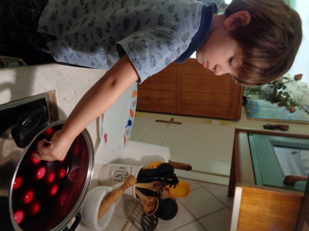 dying eggs with red colour  for Easter...my grandson ..last year Easter!!