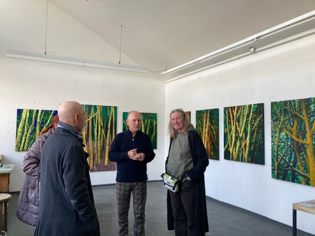 Jan in his studio with guests