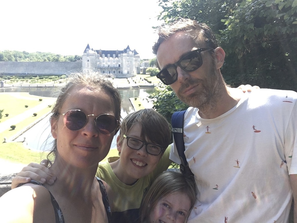 Family portrait with a beautiful French castle in the background (home exchange 2019)