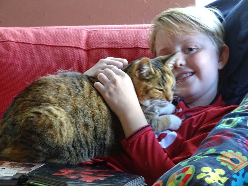 Our son with Winnie the cat