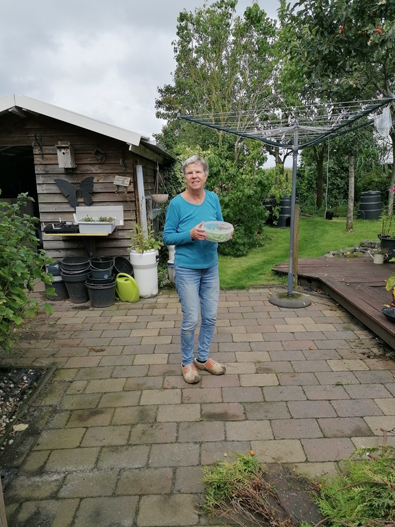 Baukje with harvest and wooden shoes (klompen)