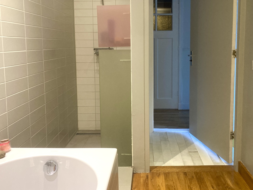 While we do have a comfortable bath, the bathroom has a walk in shower. 