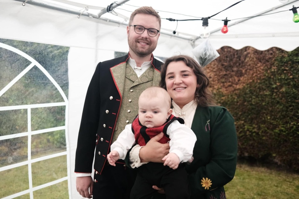 Us in the traditional Norwegian clothing (not our kid, our nephew)