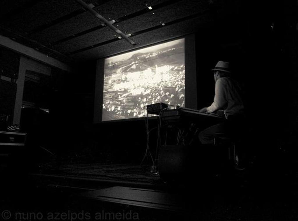 Pedro (AKA Charlie Mancini) playing in Budapest as a silent film accompanist. 