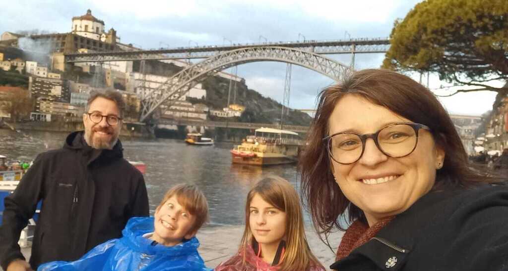 Oporto is too far for a 1 day trip... but definitly worth visititing if you have a couple of extra days.