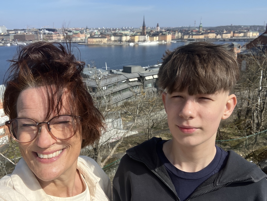 Pelle, born 2011, with mom, with Stockholm in the background - View from Skinnarviksberget mountain at Södermalm
