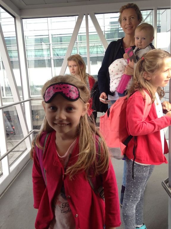 Hard to capture the whole crew, but here is an attempt in an airport somewhere. 