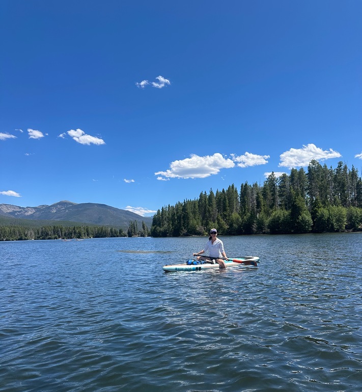 Paddle boarding at a mountain lake