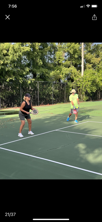 Playing pickleball in our community.